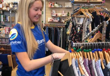 Student volunteer in shop retail